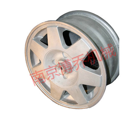 低壓鑄造機(jī)鑄造車輪成型圖 低壓鑄造機(jī)鑄造車輪成型圖